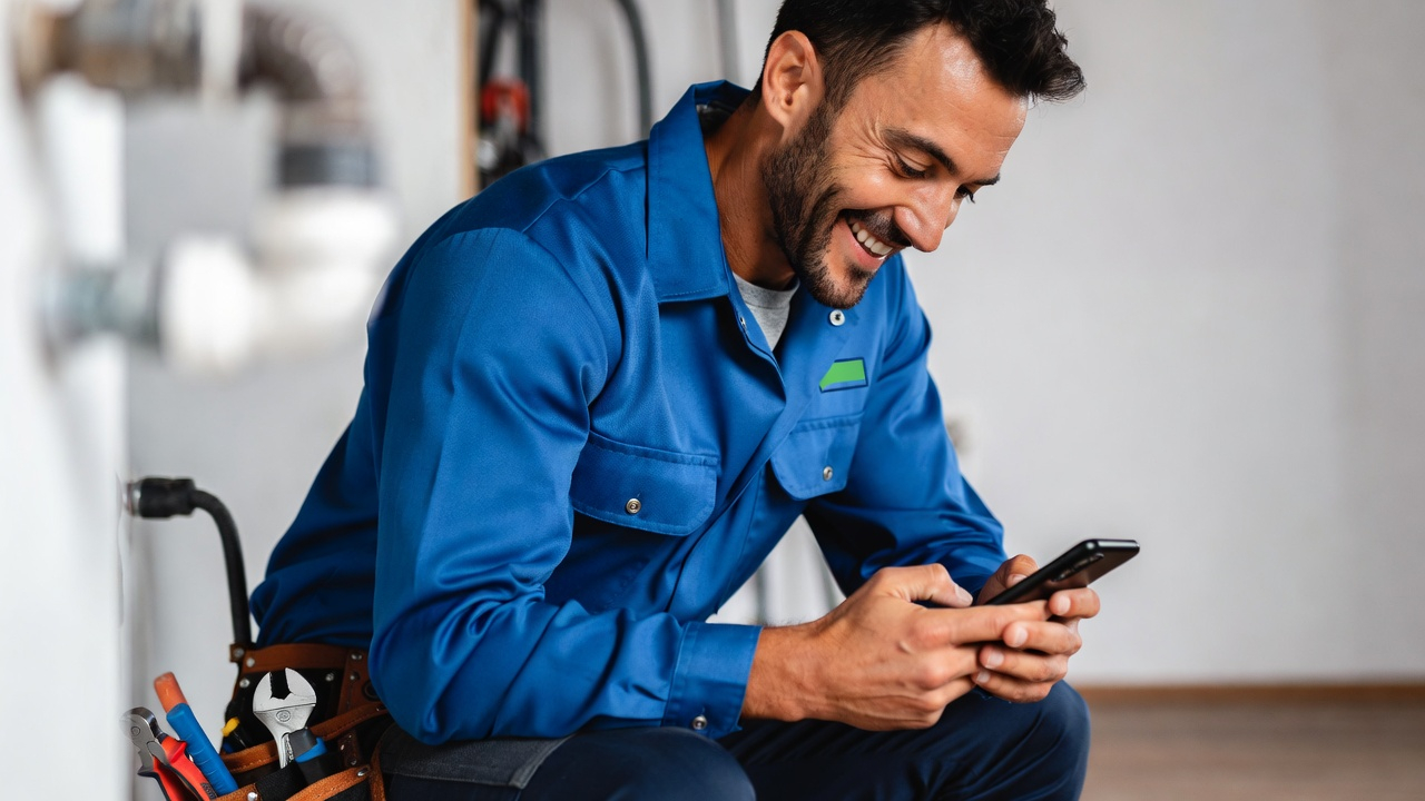 Home services business owner replying to enquiries